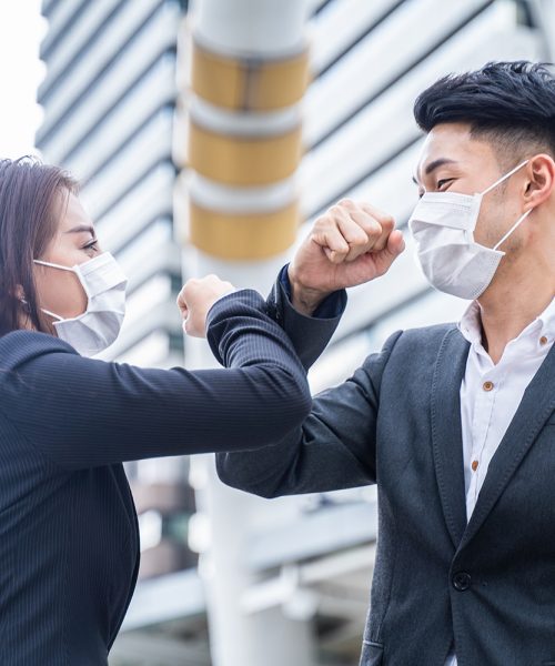 asian-business-people-wearing-protective-face-mask